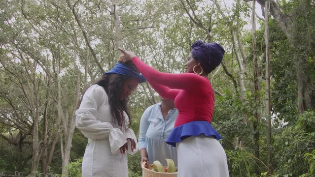 Woman carrying fruit basket on head