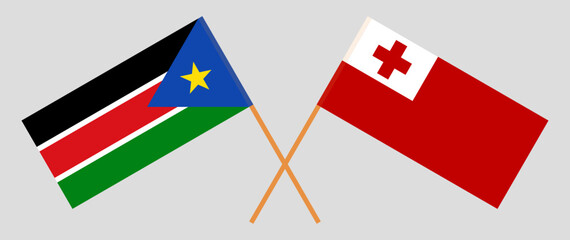 Crossed flags of South Sudan and Tonga. Official colors. Correct proportion