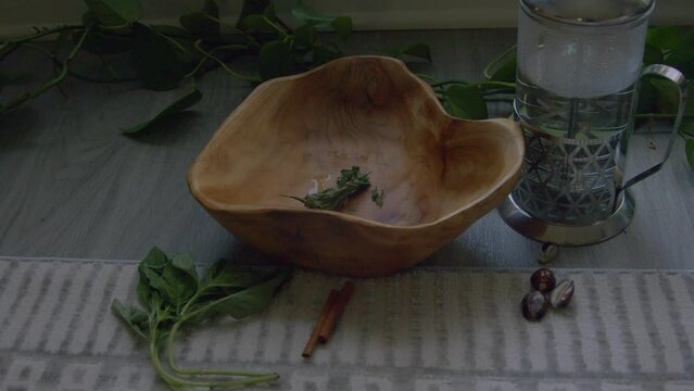 Bowl of herbs in preparation for spiritual bath
