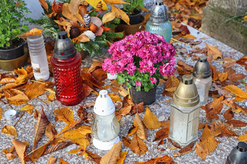 Lanterns on the tombstone in the public cemetery