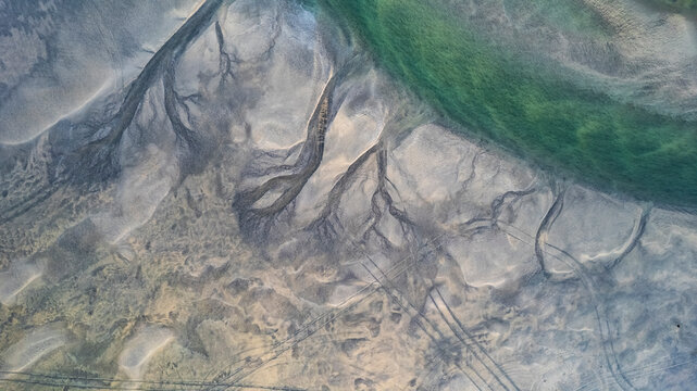Aerial view of water formation along the coast in Iceland.