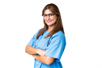 Middle age nurse woman over isolated background with arms crossed and looking forward
