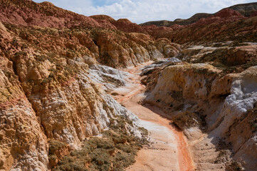 Landscape of multi-colored clay dunes. Mars on earth.