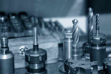 Close-up scene the group of used cutting tools for CNC milling machine.