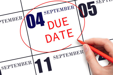 4th day of September. Hand writing text DUE DATE on calendar date September 4 and circling it....