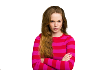 Young caucasian redhead woman isolated frowning face in displeasure, keeps arms folded.