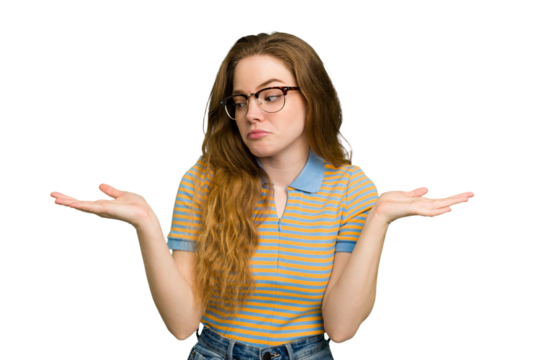 Young caucasian redhead woman isolated confused and doubtful shrugging shoulders to hold a copy space.