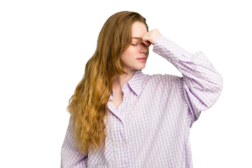 Young caucasian redhead woman isolated having a head ache, touching front of the face.