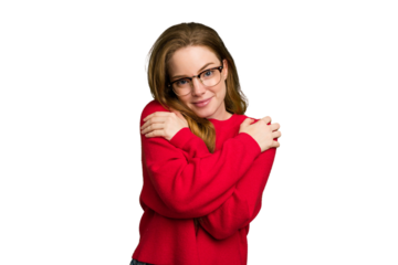 Young caucasian redhead woman isolated hugs, smiling carefree and happy.