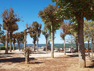 Royal Bastide of Domme on Périgord Noir. Shaded park of Esplanade de la Barre at the top of the...