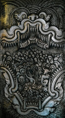 Fototapeta na wymiar Silver carving. Thai style silver carving art at temple wall, Wat Srisuphan Chiang Mai, Thailand