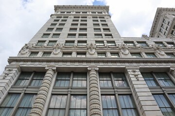 Low angle of an old white building of downtown New Orleans, Louisiana