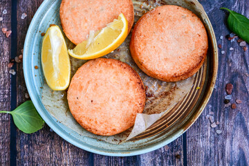 Homemade ketogenic  Salmon Burger with Tartar Sauce and  whole grain ketgenic bread. Healty diet  food