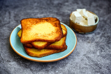 French toast  and white cheese. Rustic breakfast  made from deep fried   bread   with organic free range   eggs