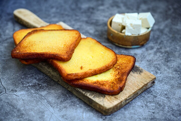 French toast  and white cheese. Rustic breakfast  made from deep fried   bread   with organic free range   eggs