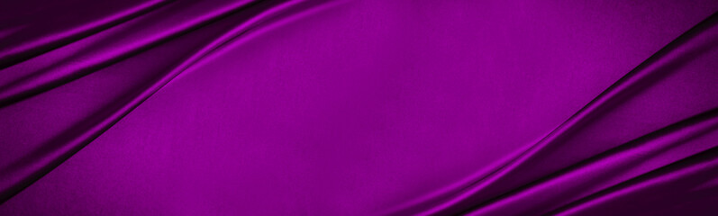 Dark magenta purple silk satin. Soft folds on a shiny fabric. Luxury background with space for design. Banner. Wide. Long. Panoramic. Christmas, Valentine. Flat lay, top view table. Template.