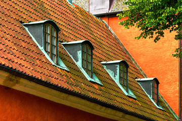 Old attic dormer roof window in Halmstad, Sweden
