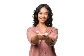 Young Argentinian woman over isolated background holding copyspace imaginary on the palm to insert an ad
