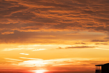 Orange dawn. dramatic sky at dawn. Orange dawn at sea