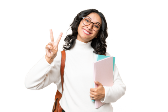 Young Argentinian student woman over isolated background smiling and showing victory sign