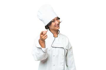 Young chef Argentinian woman over isolated background points finger at you with a confident expression