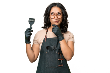 Young argentinian hairdresser woman over isolated background having doubts