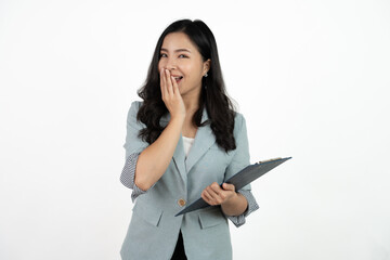 Portrait happy beautiful young asian business woman long hair standing and holding clipboard with looking to camera and smile over white background.