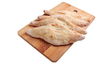 Traditional iraqi bread on a wooden tray