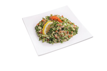 Arabic dish tabbouleh on a square white plate