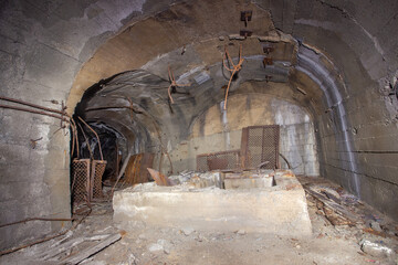 Old gold mine underground tunnel shelter bunker with concrete lining