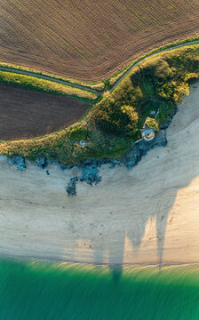 Aerial view of Harbour Cove beach, Padstow, Cornwall, UK.