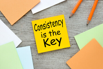 Sticky note on table, Consistency is key