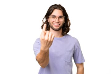 Young handsome man over isolated background doing coming gesture
