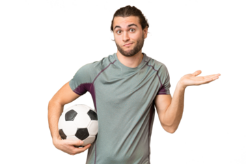 Young handsome football player man over isolated background having doubts while raising hands