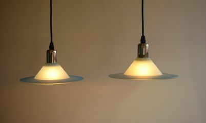 Hanging blue glass lamps in UFO inspired design, Denmark 1980s. © Peter