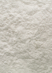 Fototapeta na wymiar Background with flour. Sifted spelled flour texture.
