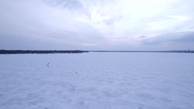 Kite skiing on a frozen Lake Monona in Madison, WI. 