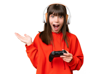 Little caucasian girl playing with a video game controller over isolated background with shocked facial expression