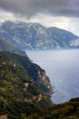 Obraz premium Rocky Cliffs and Mountain Landscape by the Tyrrhenian Sea. Amalfi Coast, Italy. Nature Background.