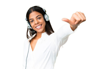 Telemarketer African American woman working with a headset over isolated chroma key background...