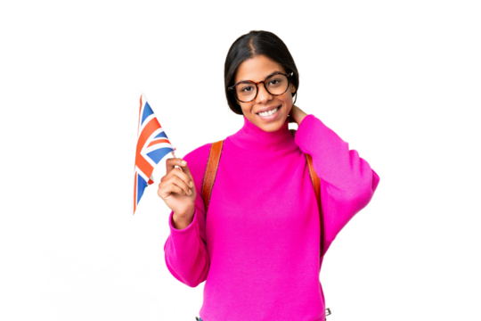 Young African American woman holding an United Kingdom flag over isolated chroma key background laughing