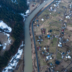 Naklejka premium Top view of a mountain village of Ukraine in winter.