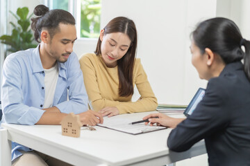 Fototapeta premium Happy asian couple client, tenant buyer home ,apartment, sign signature contract rental, purchase. Landlord, realtor agreement after bank approve mortgage, loan success or done. Property agent concept