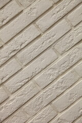 Diagonal texture of white brick as a background.