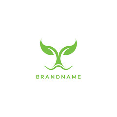 Whale tail from green leaves logo
