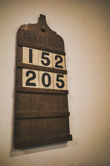 Wooden hymn board with hymn numbers - obrazy, fototapety, plakaty