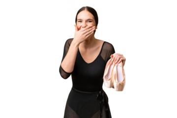 Young caucasian woman practicing ballet over isolated background happy and smiling covering mouth with hand