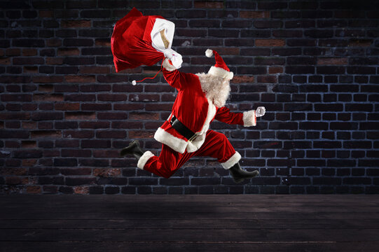 santa claus runs fast to deliver all gifts for christmas
