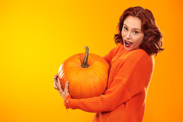 teen with pumpkin