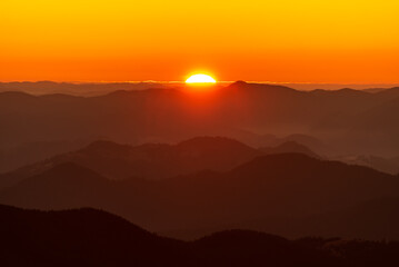 Fototapeta premium A beautiful sunset over the mountains. 